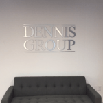 3D letters make up a Lobby Sign Dennis Group Brushed Aluminum