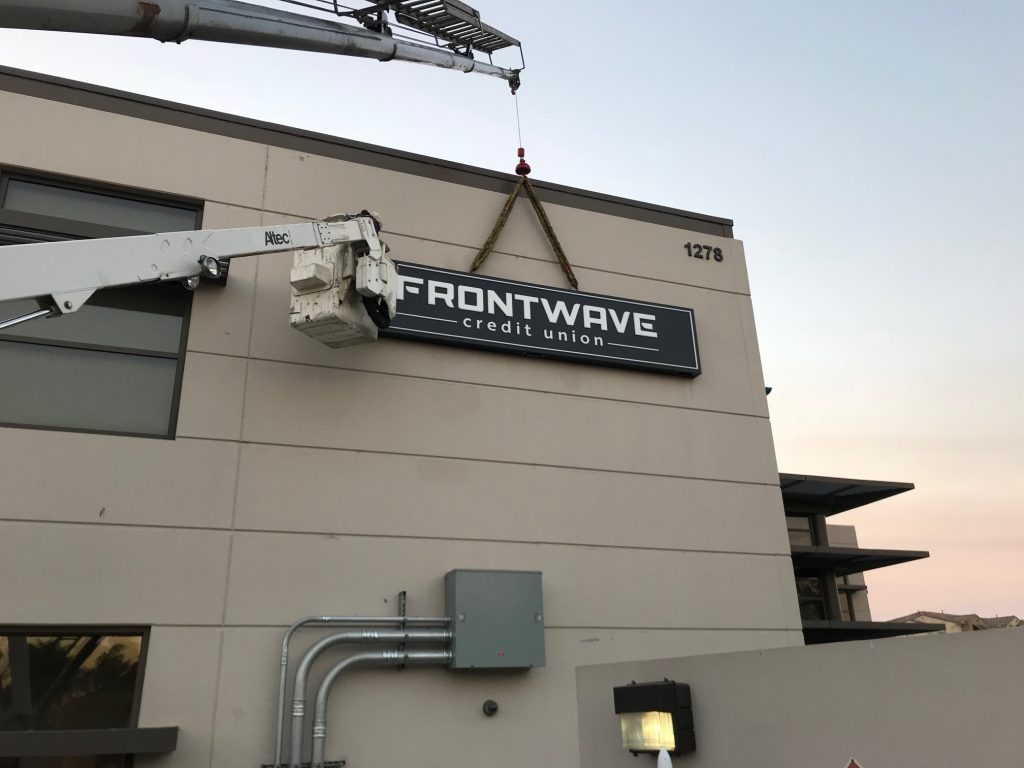 Installing a Hybrid Cabinet and Channel Letter Illuminated Sign