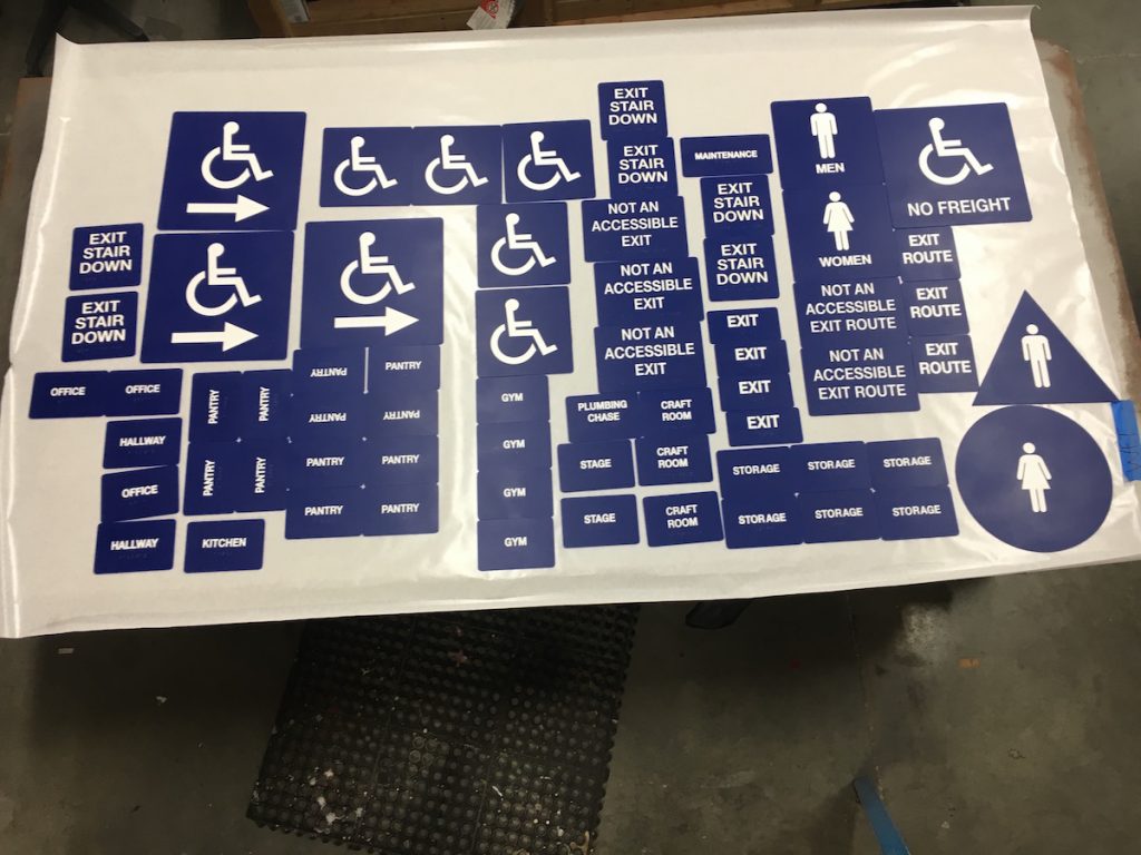 here are a series of ADA signs ready for installation