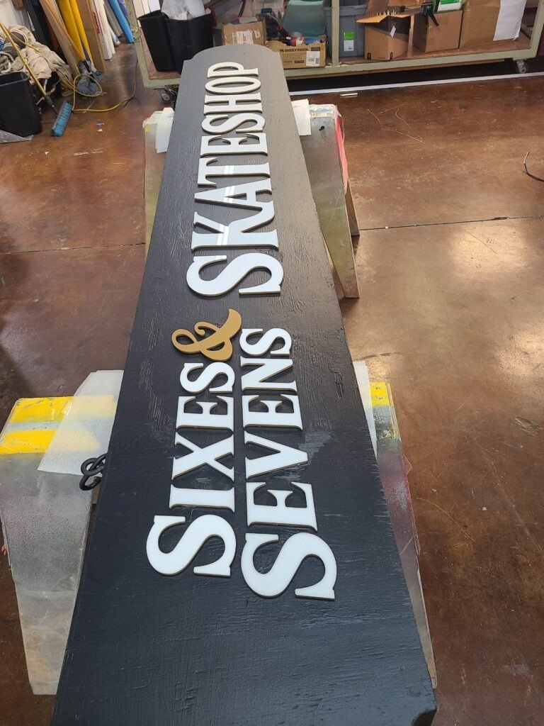 Wood Blade Sign Sixes and Sevens full